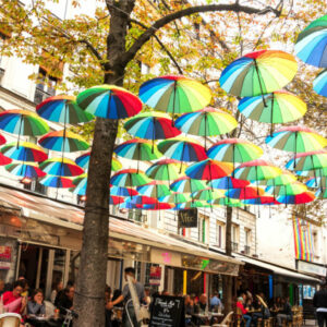 Visit Marais - street covered with umbrellas Françoise H
